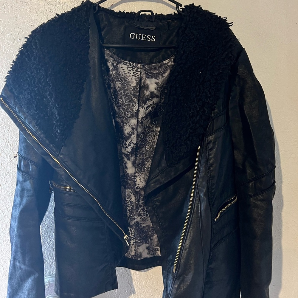 Long sleeves with faux-fur cuffs
Asymmetrical zip-front closure 100% Polyester